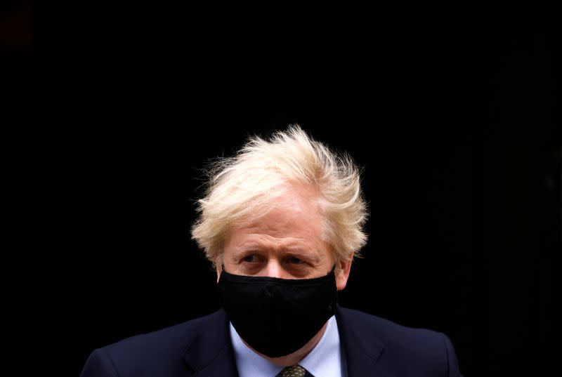 Britain's Prime Minister Boris Johnson leaves Downing Street, in London