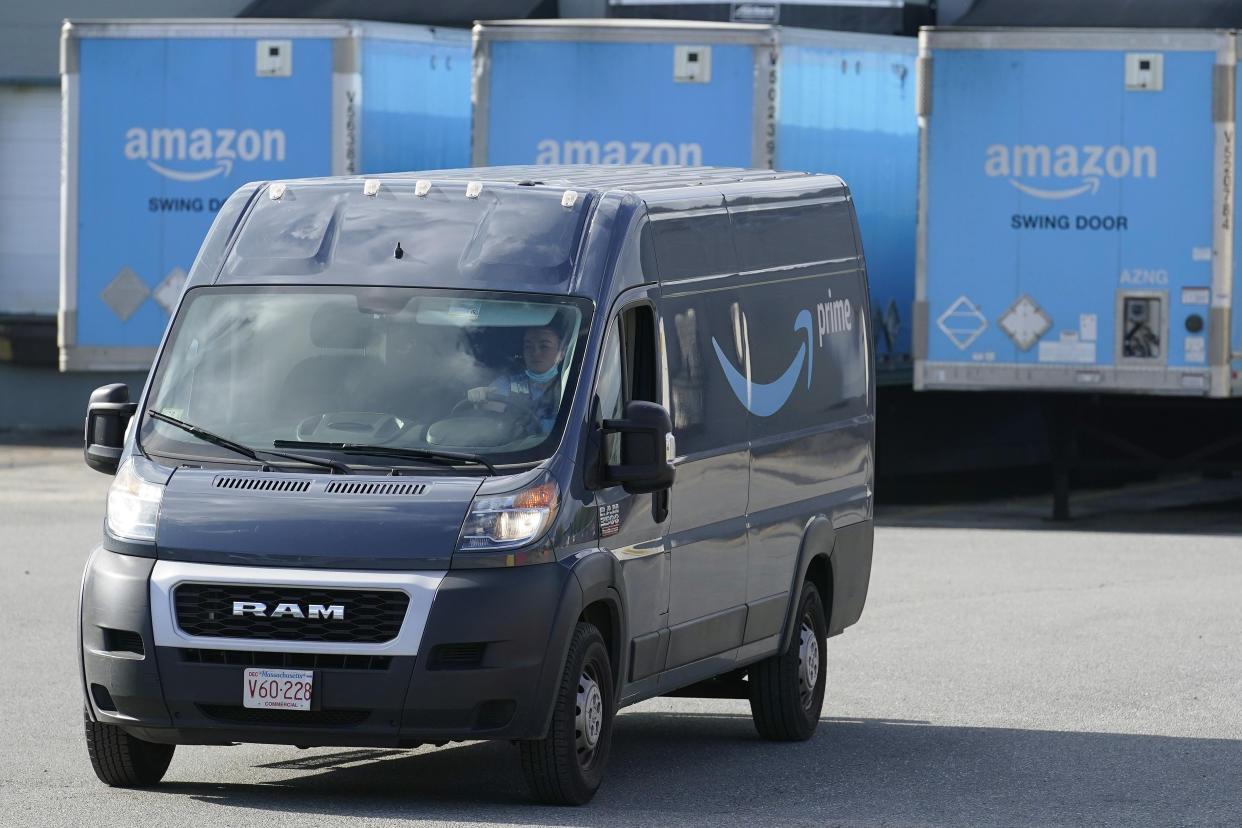 An Amazon delivery van departs an Amazon Warehouse location, Thursday, Oct. 1, 2020, in Dedham, Mass. (AP Photo/Steven Senne)