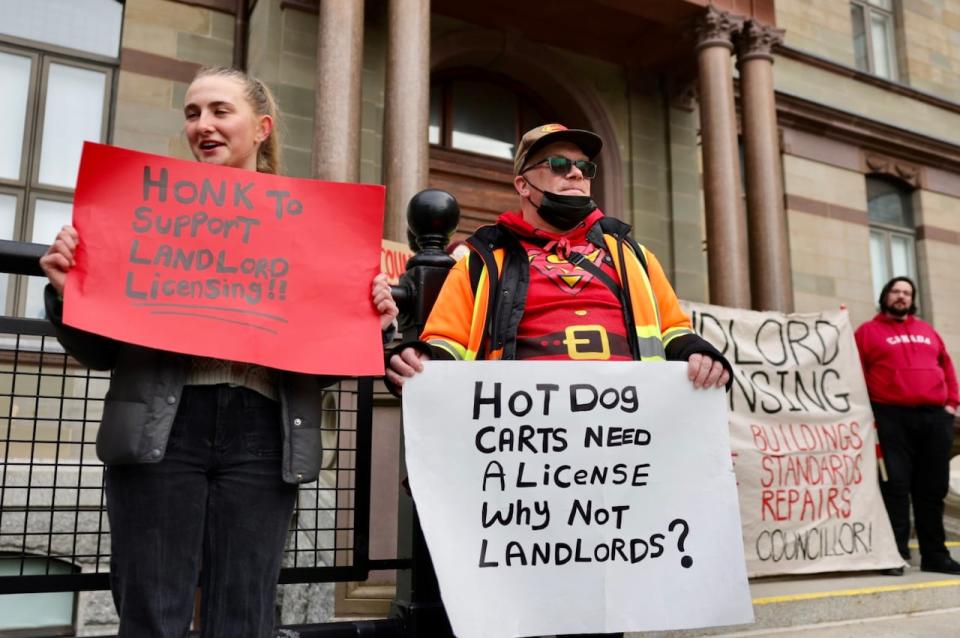 Advocates with ACORN, an organization for low-income residents, gathered in front of city hall today to show their support for the new rental registry bylaw.