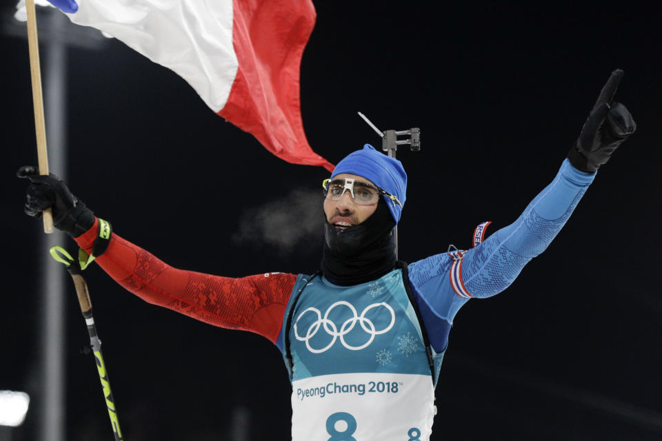 <p>Martin Fourcade of France took gold in the men’s 12.5-kilometer biathlon pursuit. Sebastian Samuelsson of Sweden took silver and Germany’s Benedikt Doll took bronze. (AP) </p>