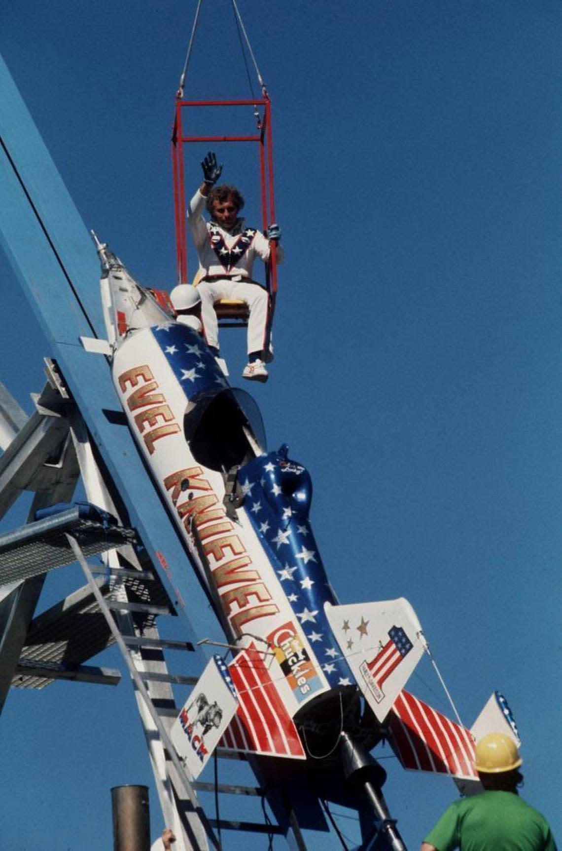 Evel Knievel waves as he is lowered into his rocket in this Sept. 8, 1974, file photo before his failed attempt at a highly promoted 3/4-mile leap across the Snake River Canyon outside Twin Falls.