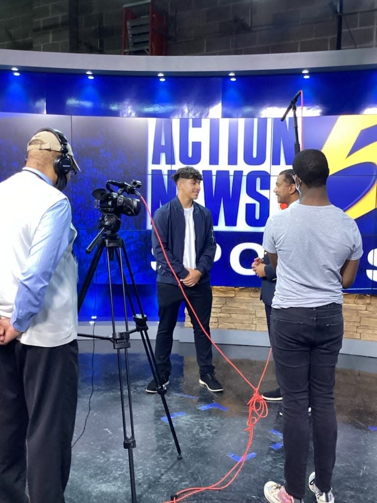 Sergio Garcia Jr. interviews WMC Action News 5 Sports Director Jarvis Greer at their broadcast station. Garcia won the Emerging Film Competition for his feature on Greer in June 2022.