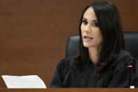 Judge Elizabeth Scherer reads instructions to potential jurors during jury selection in the penalty phase of the trial of Marjory Stoneman Douglas High School shooter Nikolas Cruz at the Broward County Courthouse in Fort Lauderdale on Monday, May 16, 2022. Cruz previously plead guilty to all 17 counts of premeditated murder and 17 counts of attempted murder in the 2018 shootings. (Amy Beth Bennett/South Florida Sun Sentinel via AP, Pool)