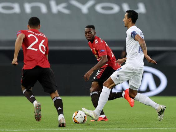 Zeca is put under pressure by Mason Greenwood and Aaron Wan-Bissaka (Getty)