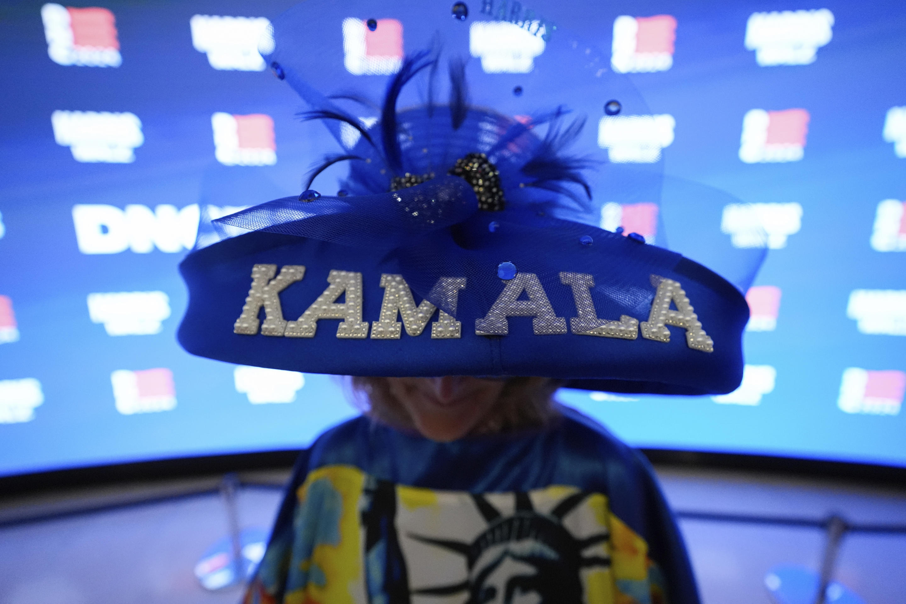 A Mississippi delegate shows off her Kamala hat at the Democratic National Convention in Chicago Monday. (Brynn Anderson/AP)