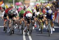 Cycling - Tour de France cycling race - The 190.5 km (118 miles) Stage 6 from Arpajon-sur-Cere to Montauban, France - 07/07/2016 - Team Dimension Data rider Mark Cavendish of Britain (C) wins on finish line. REUTERS/Jean-Paul Pelissier