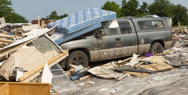 Storm damage and debris left behind at an El Reno mobile home park after a tornado on in May, 2019. The weather service says at least eight tornadoes have struck in or near El Reno since 2000.