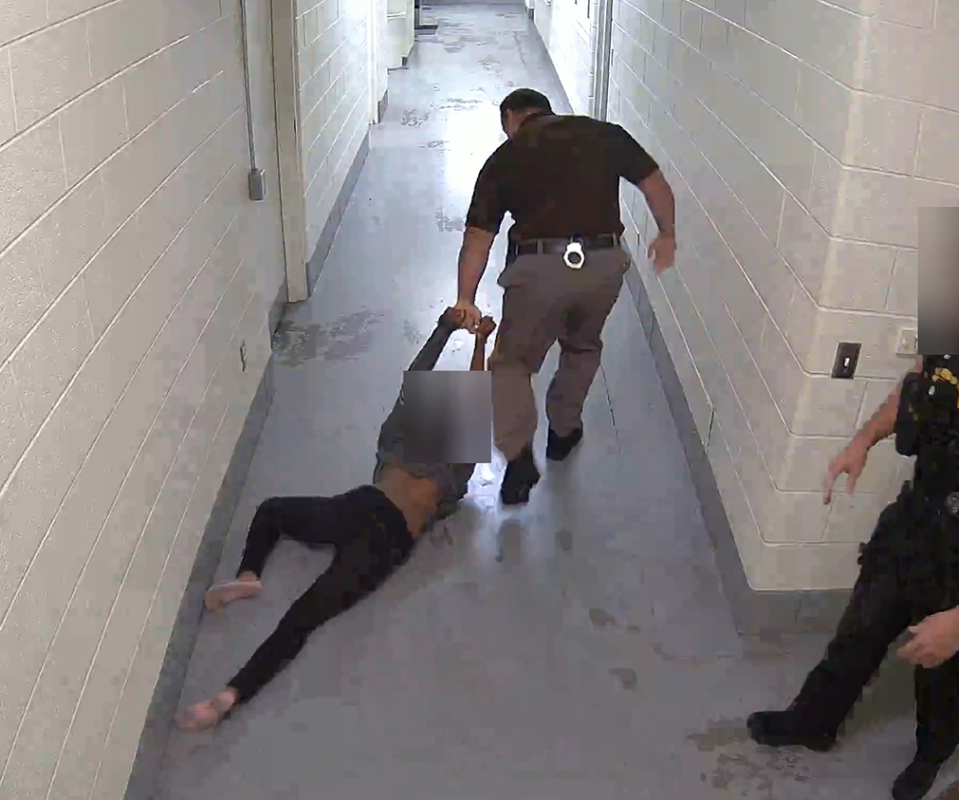 New Castle County Police video captures former Cpl. Michael Carnevale dragging a 16-year-old girl on her belly while her wrists are handcuffed. Carnevale pleaded guilty on Thursday to offensive touching.