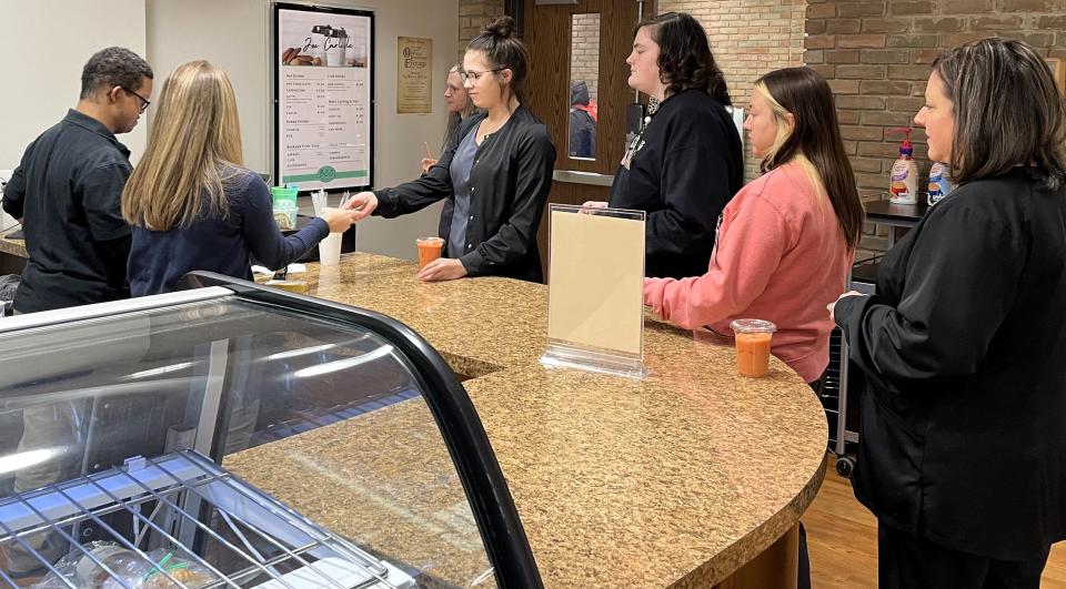 Adult education students in the introduction to business and marketing course at Buckeye Career Center. The program is being offered at the Coshocton County Career Center.