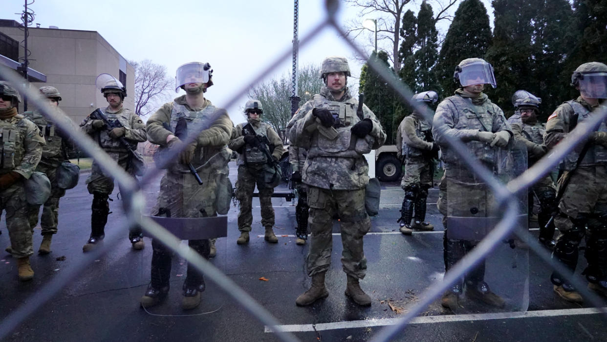 National Guard soldiers and police protect the Brooklyn Center Police station as demonstrators protest the shooting death of Daunte Wright on April 13, 2021 in Brooklyn Center, Minnesota. (Scott Olson/Getty Images)