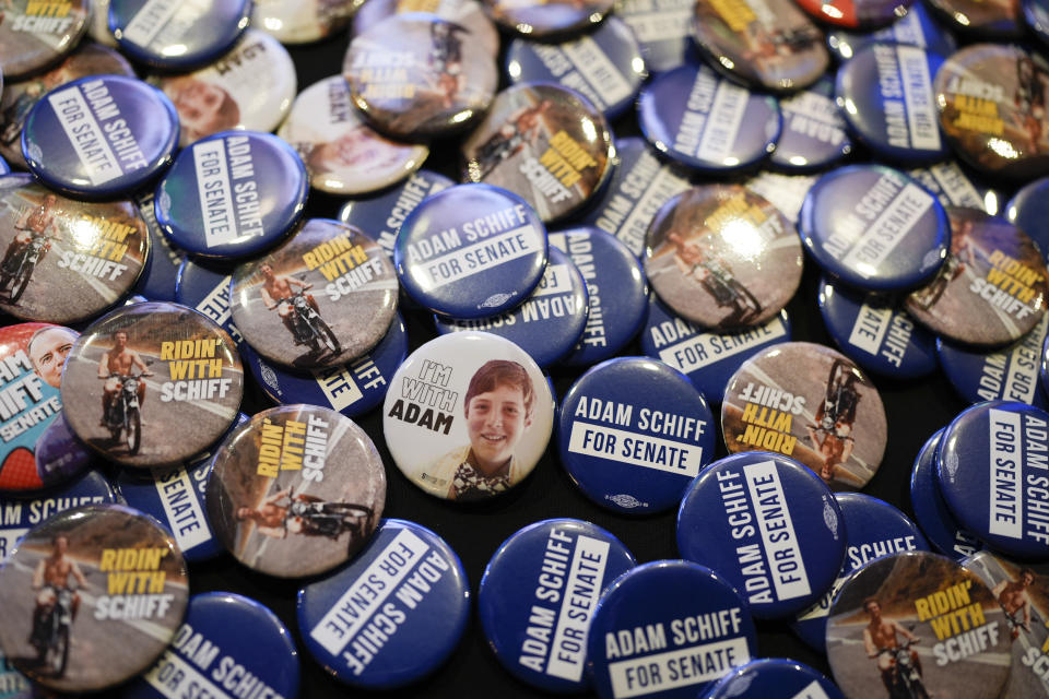 Buttons are displayed during an election party for U.S. Rep. Adam Schiff, D-Calif., a U.S Senate Candidate, Tuesday, March 5, 2024, in Los Angeles. (AP Photo/Jae C. Hong)