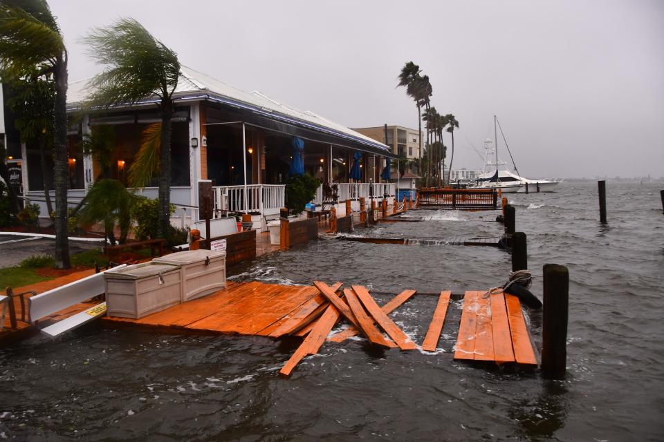 The docks at the Sunset Cafe in Cocoa Beach sustained heavy damage.