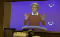 European Commission President Ursula von der Leyen speaks via video conference into a press room at EU headquarters in Brussels, Wednesday, Oct. 28, 2020. The European Commission on Wednesday, is launching an additional set of actions, to help limit the spread of the coronavirus, save lives and strengthen the internal market's resilience. (AP Photo/Virginia Mayo, Pool)