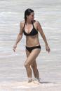 <p>Courteney Cox, 54, rocks a black bikini while in the Bahamas. (Photo: BackGrid) </p>
