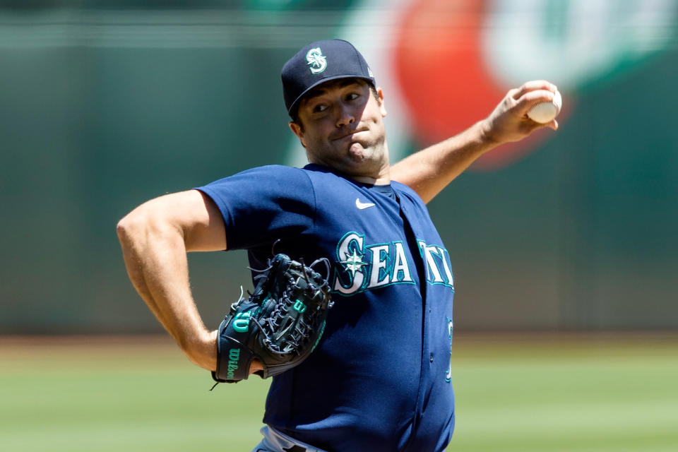 Seattle Mariners' Robbie Ray pitches against the Oakland Athletics during the first inning of a baseball game in Oakland, Calif., Thursday, June 23, 2022. (AP Photo/John Hefti)