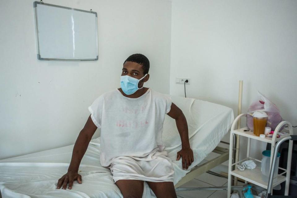 A man recovering from COVID-19 sits in his rehabilitation room at the Doctors Without Borders Drouillard Hospital in Cite Soleil, Haiti, on June 3, 2020. The population’s skepticism about whether the contagion even exists has led to a quickly mounting death toll.