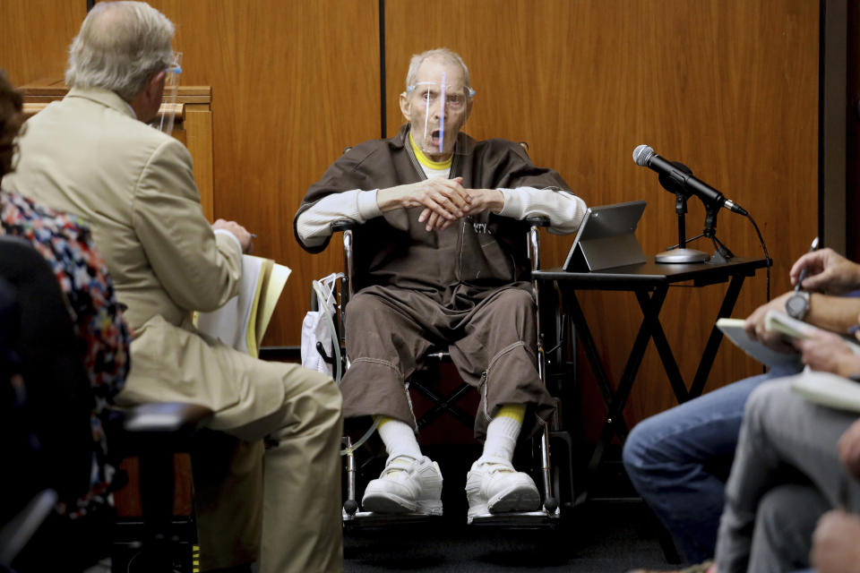 New York real estate scion Robert Durst, 78, answers questions from defense attorney Dick DeGuerin, left, as he testifies in his murder trial at the Inglewood Courthouse on Monday, Aug. 9, 2021, in Inglewood, Calf. Durst is charged with the 2000 murder of Susan Berman inside her Benedict Canyon home. He testified Monday that he did not kill his best friend Berman. (Gary Coronado / Los Angeles Times via AP, Pool)