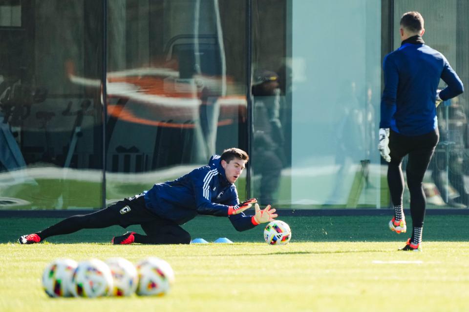 Crew goalkeeper Patrick Schulte makes a save during preseason training.