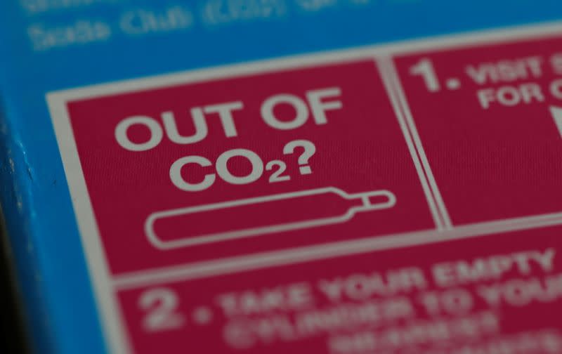 An information label is seen on packaging for a CO2 cylinder for a fizzy drinks machine in Manchester