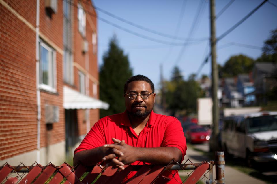 Robert Richardson poses near his home in the West Price Hill neighborhood of Cincinnati on Monday, Sept. 21, 2020. Richardson has contemplated making a career change as his current job as a private security guard has seen severe cutbacks in staffing and hours. 