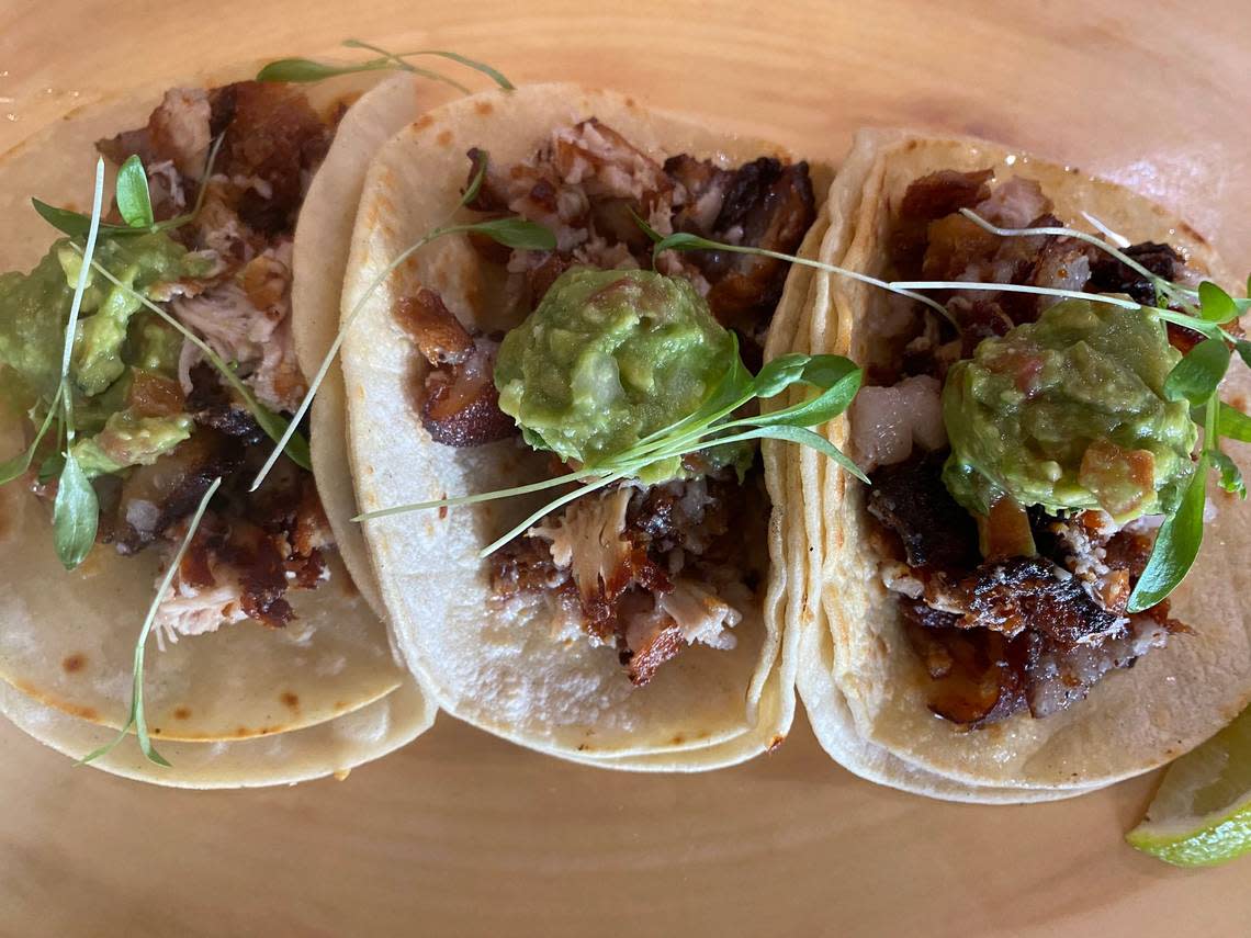 The “La Piedad” tacos on the special anniversary menu at Molino’s Mexican Cuisine are made with crispy pork belly, green tomatillo salsa and guacamole on corn or flour tortillas.