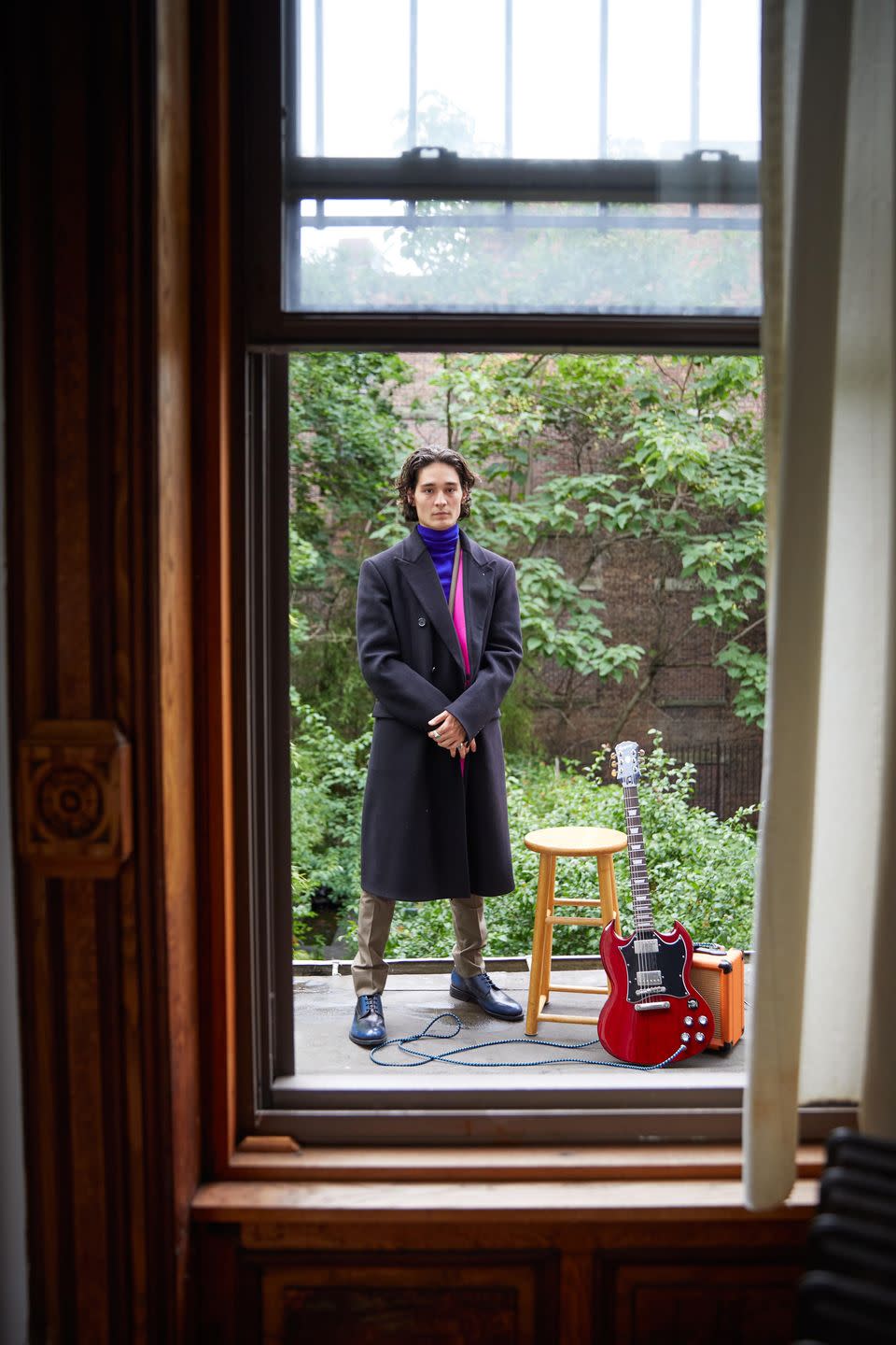 <p><em>Coat, jacket, turtleneck, and trousers by Brioni; shoes by Santoni.</em></p>