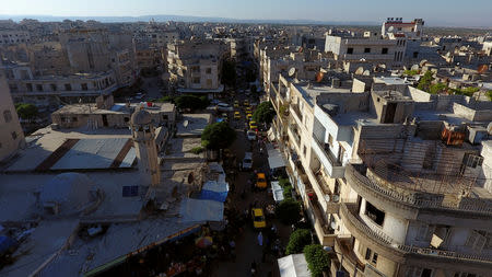 FILE PHOTO:A general view taken with a drone shows part of the rebel-held Idlib city, Syria June 8, 2017. REUTERS/Ammar Abdullah/File Photo