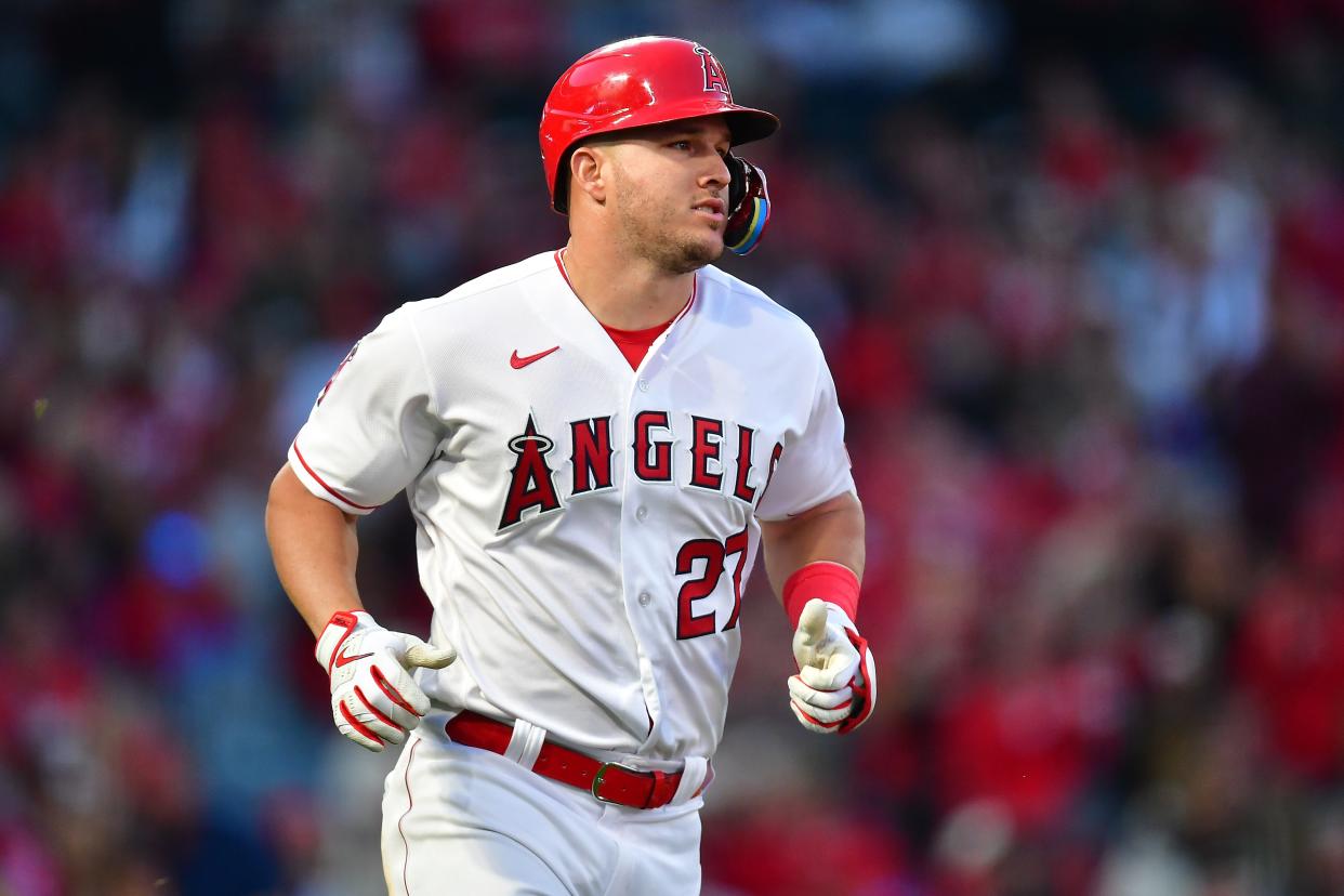Los Angeles Angels center fielder Mike Trout runs after hitting a single against the Texas Rangers last season at Angel Stadium.