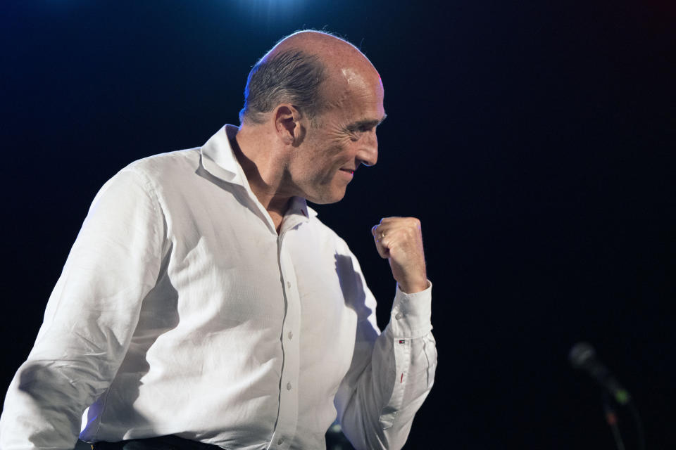 Uruguay's presidential candidate for the Broad Front ruling party, Daniel Martinez, gestures during his speech at a cultural event in Montevideo, Uruguay,Tuesday, Nov. 19, 2019. Uruguay will hold run-off presidential elections on Nov. 24 between Daniel Martinez and the presidencial candidate for the National Party, Luis Lacalle Pou . (AP Photo/Matilde Campodonico)