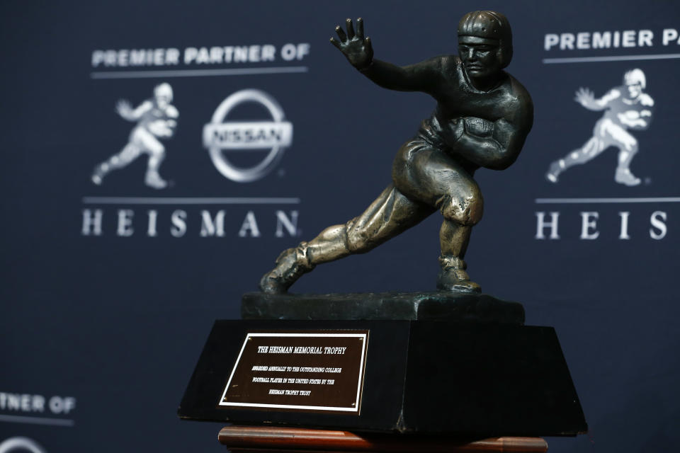 The Heisman Trophy Trust filed a lawsuit against a website for prominently using photos of its trophy.