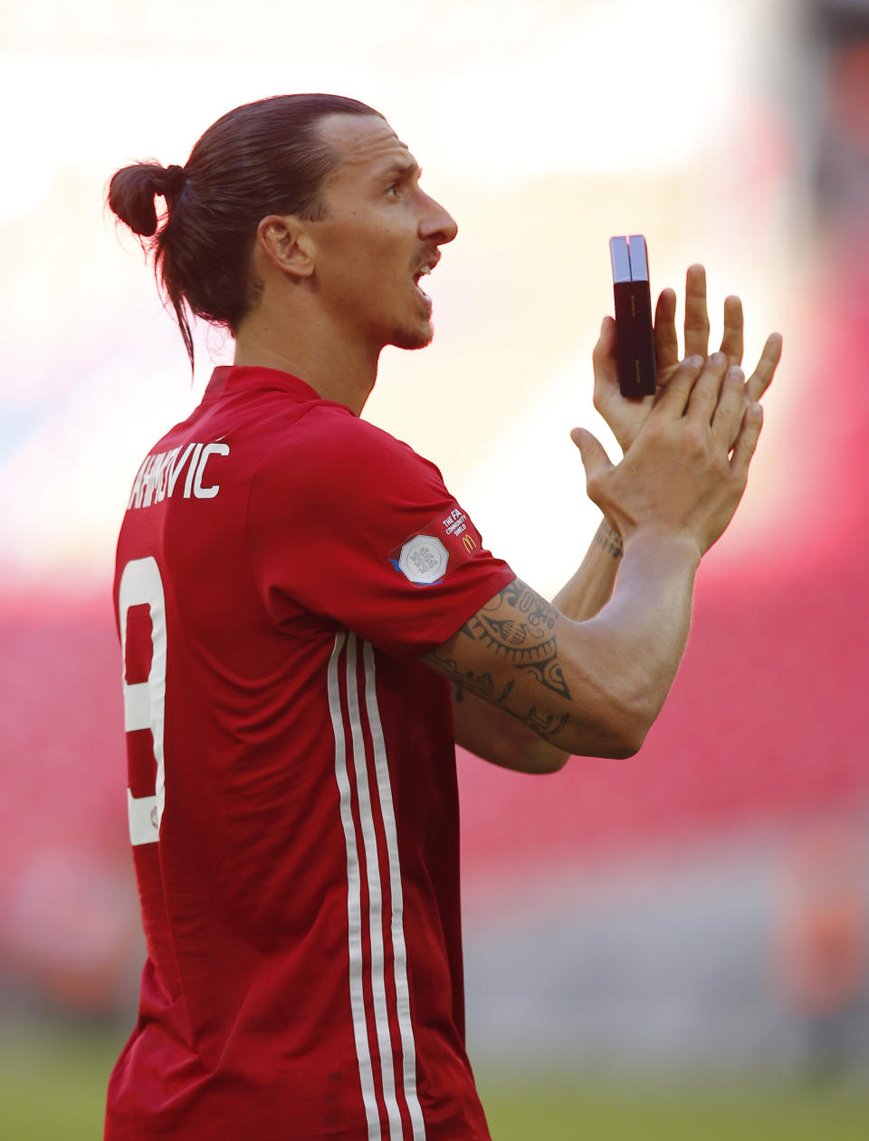 Football Soccer Britain - Leicester City v Manchester United - FA Community Shield - Wembley Stadium - 7/8/16 Manchester United's Zlatan Ibrahimovic applauds fans after winning the FA Community Shield Action Images via Reuters / Andrew Couldridge Livepic EDITORIAL USE ONLY. No use with unauthorized audio, video, data, fixture lists, club/league logos or "live" services. Online in-match use limited to 45 images, no video emulation. No use in betting, games or single club/league/player publications. Please contact your account representative for further details.