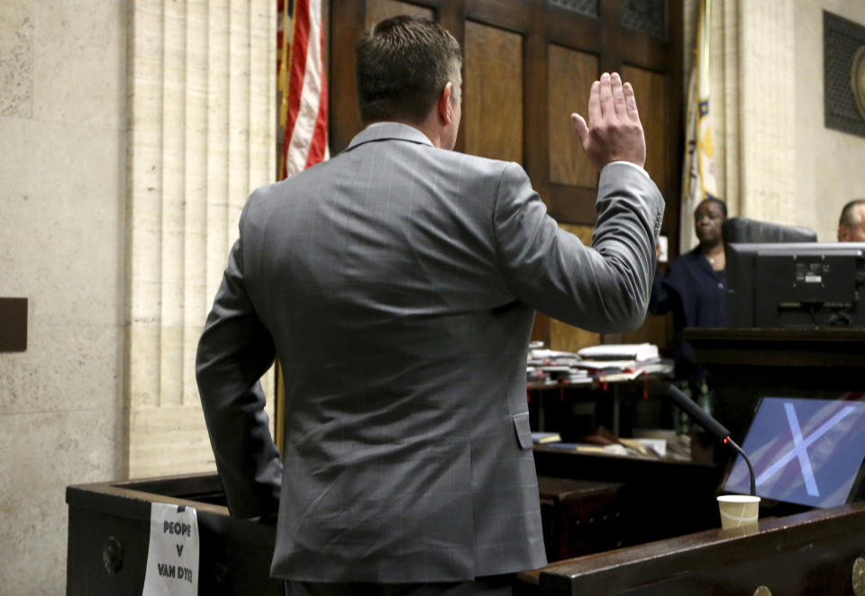 Chicago police Officer Jason Van Dyke is sworn in before taking the stand in his murder trial Tuesday Oct. 2, 2018 for the shooting death of Laquan McDonald, in Chicago. (Antonio Perez/Chicago Tribune via AP, Pool)