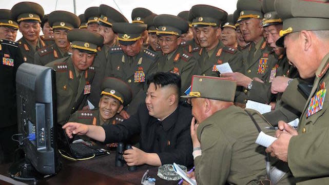 Dear Leader Kim Jong Un and friends having way too much fun with a PC