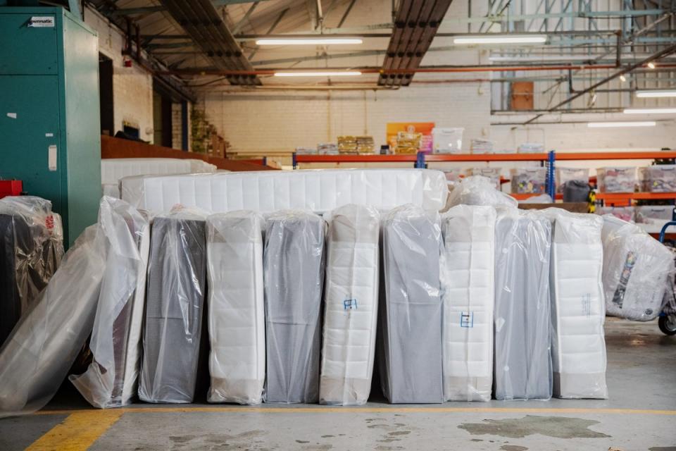 Mattresses are lined up, ready to be dispatched, at the Zarach charity’s headquarters (William Lailey SWNS)