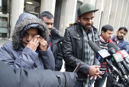 Santhanaladchumy Kanagaratnam, mother of Kirushna Kumar Kanagaratnam who was killed by Canadian serial killer Bruce McArthur, reacts as his friend Piranavan Thangavel speaks to reporters after McArthur was sentenced to life imprisonment following his guilty plea to eight counts of first-degree murder, in Toronto, Ontario, Canada, February 8, 2019. REUTERS/Chris Helgren