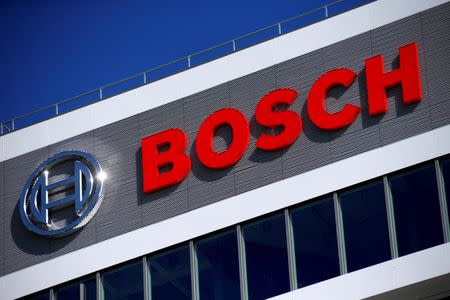 A company logo on BOSCH building is pictured at the company's new research and advance development centre Campus Renningen during a guided media tour in Renningen, Germany, September 30, 2015. REUTERS/Ralph Orlowski/File Photo