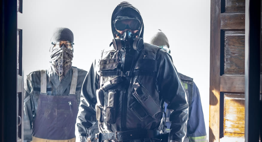 Pandemic survivors in hazmat suits survey the damage wrought by the Captain Trips virus in 'The Stand' (Photo: CBS/CBS Interactive)  