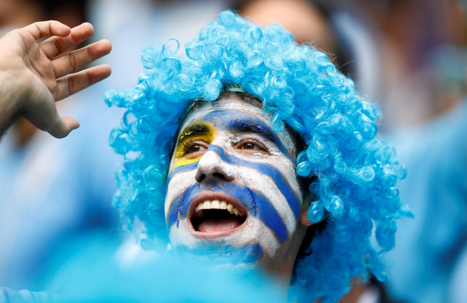 <p>A Uruguay fan at the match REUTERS/Jason Cairnduff </p>