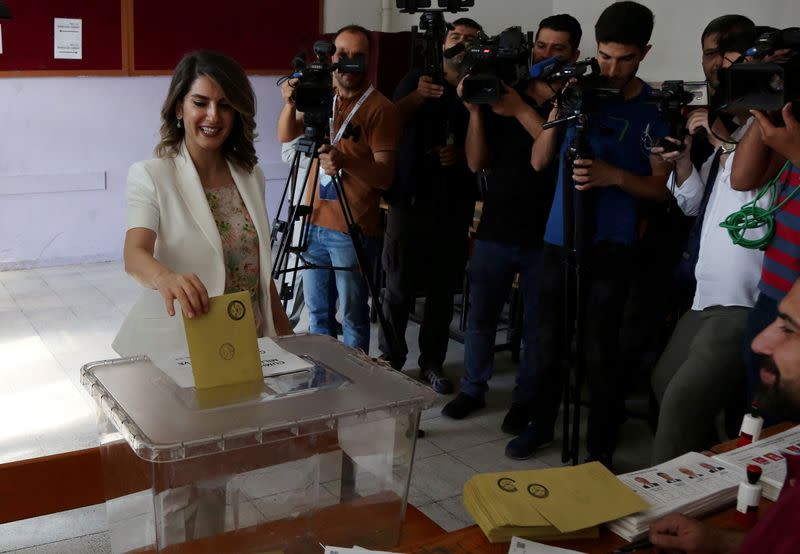 FILE PHOTO: Basak Demirtas, wife of Selahattin Demirtas, jailed former co-leader and presidential candidate of Turkey's main pro-Kurdish HDP, casts her ballot during the presidential and parliamentary elections in Diyarbakir