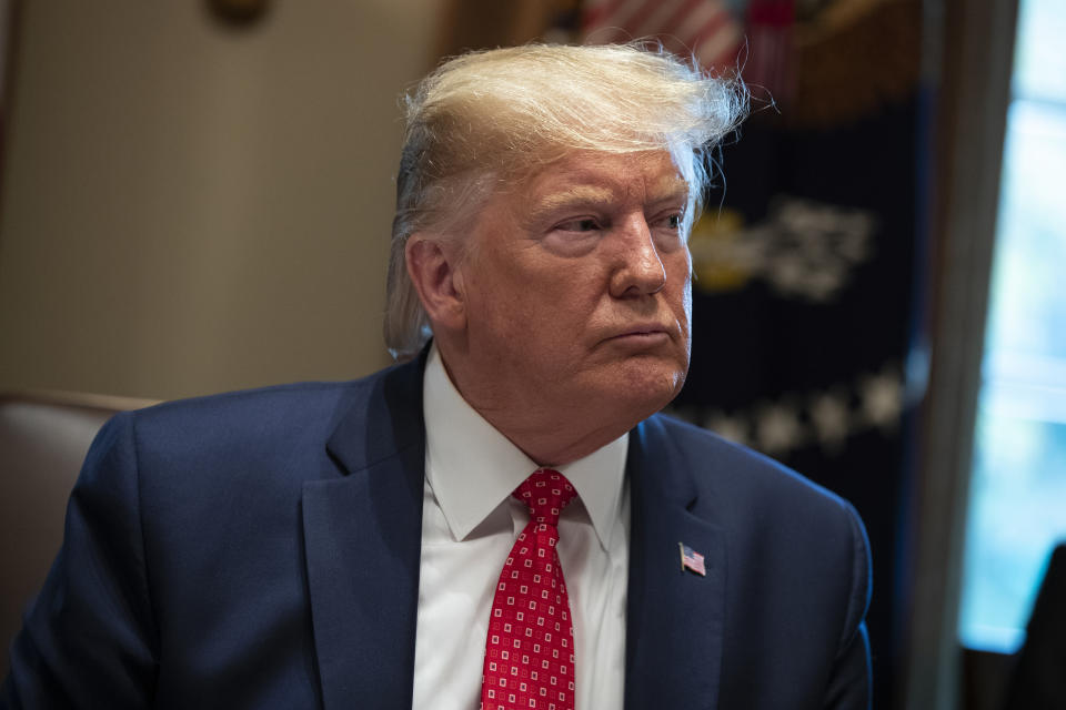 President Donald Trump listens to a question during a cabinet meeting at the White House, Tuesday, Nov. 19, 2019, in Washington. (AP Photo/ Evan Vucci)