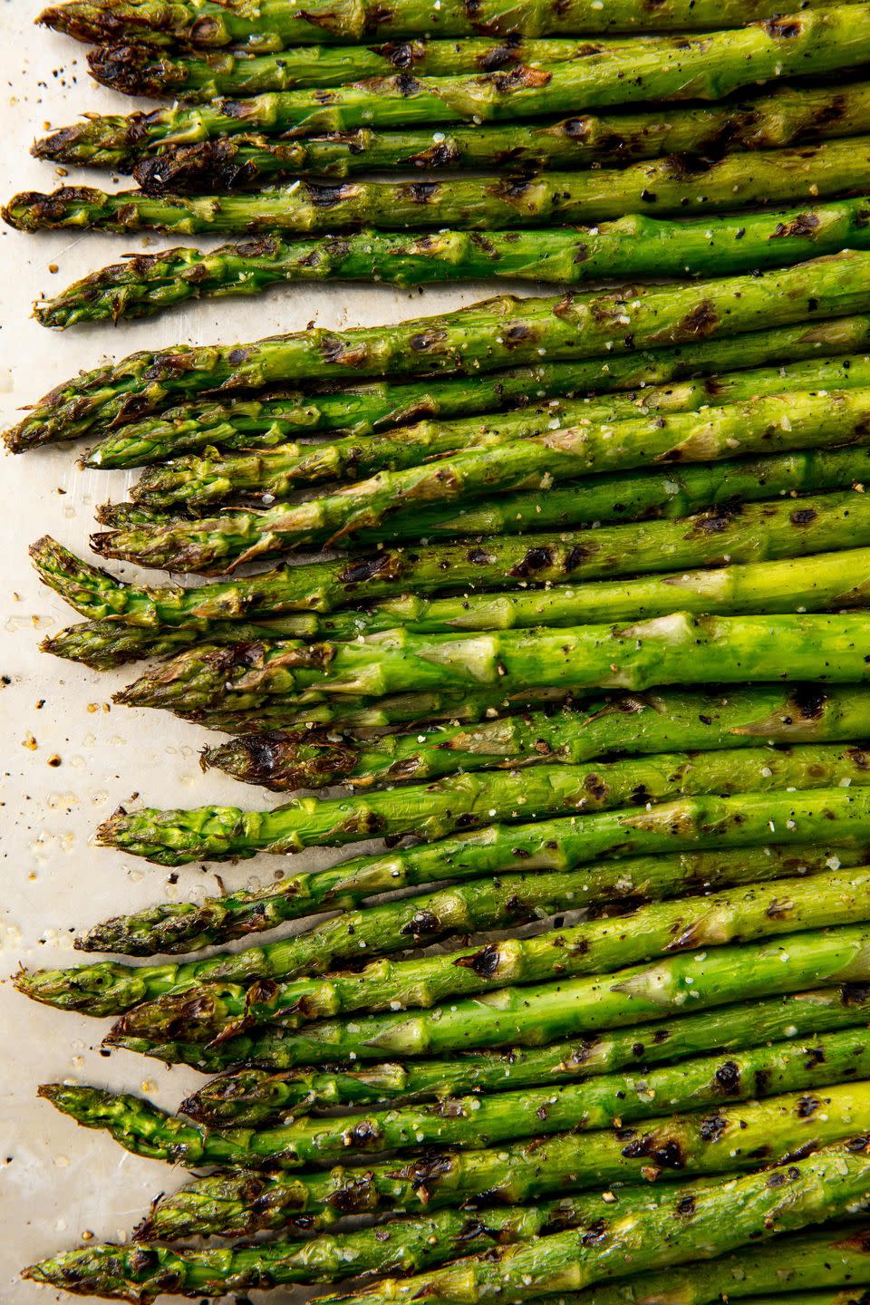 <p>Fire up the grill!</p><p>Get the recipe from <a href="https://www.delish.com/cooking/recipe-ideas/recipes/a58383/best-grilled-asparagus-recipe/" rel="nofollow noopener" target="_blank" data-ylk="slk:Delish;elm:context_link;itc:0;sec:content-canvas" class="link ">Delish</a>. </p>