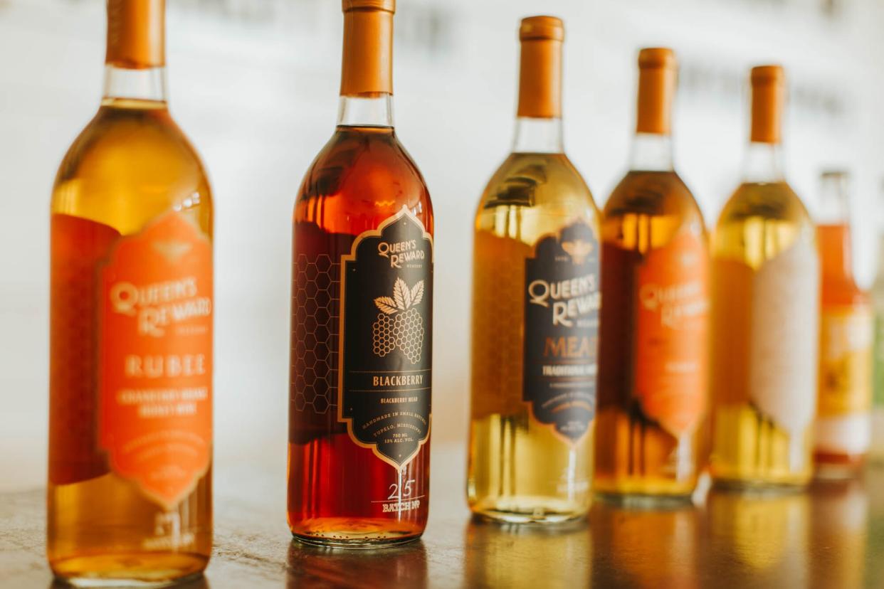 Lineup of Queen's Reward mead bottles