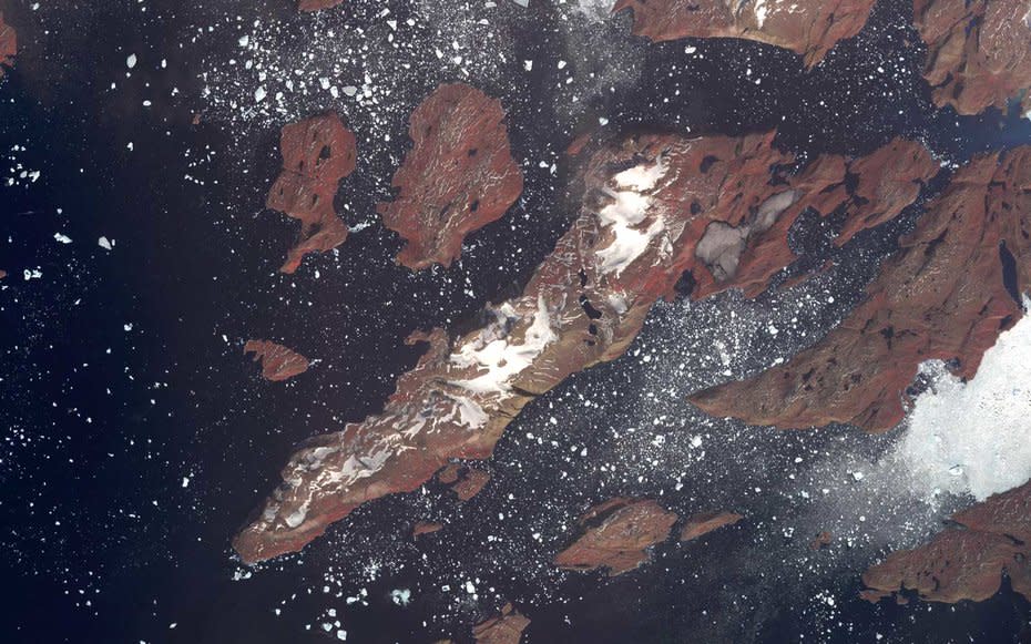 Acquired by NASA's Terra spacecraft, this image shows the west coast of Greenland, one of Earth's premiere incubators for icebergs.