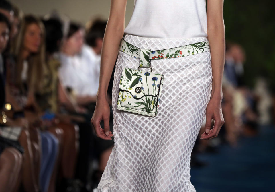 The Tory Burch Spring 2014 collection is modeled during Fashion Week in New York, Tuesday, Sept. 10, 2013. (AP Photo/Richard Drew)