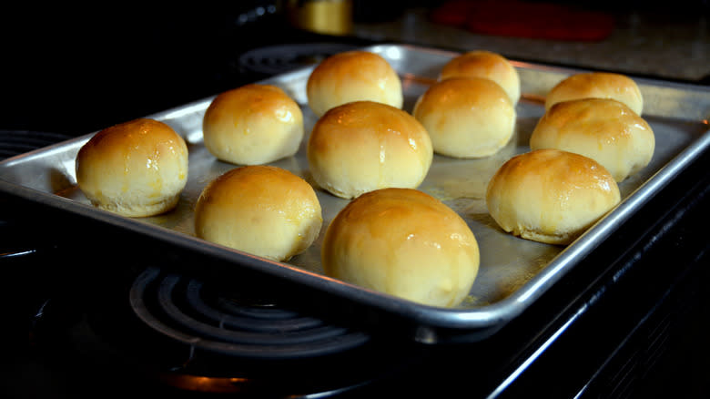 buttered rolls on baking sheet