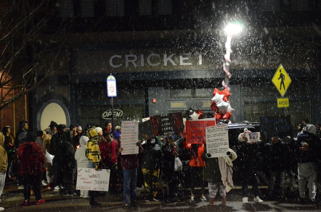 People rallied outside the Cricket Club on Monday, Nov. 29, 2021, to protest the death of Xavier West.