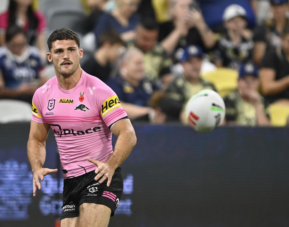 Nathan Cleary catches the ball.