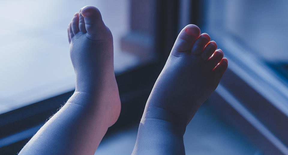 A stock image of baby's feet. A New Mexico mum has been arrested after a newborn's body was found in a rubbish bag.