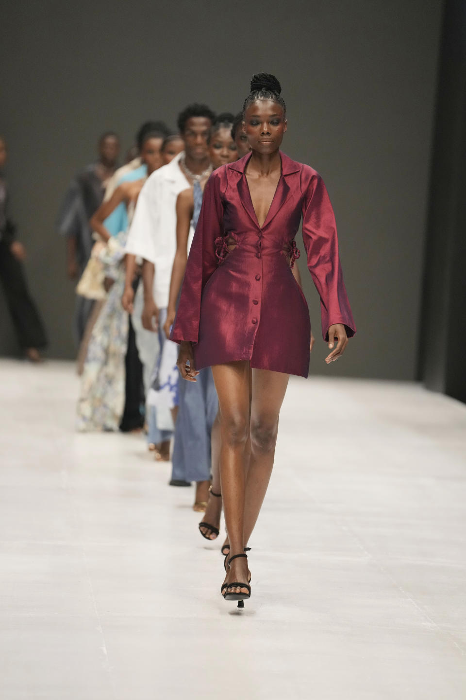 Models wear a creation by Lulla House during the Lagos Fashion Week in Lagos, Nigeria, Thursday, Oct. 26, 2023. Africa's fashion industry is rapidly growing to meet local and international demands but a lack of adequate investment still limits its full potential, UNESCO said Thursday in its new report released at this year's Lagos Fashion Week show. (AP Photo/Sunday Alamba)