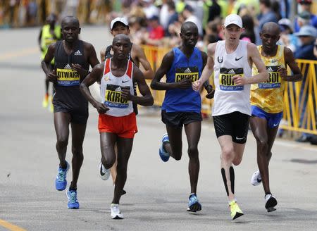 Apr 17, 2017; Boston, MA, USA; Galen Rupp runs in the lead pack during the 2017 Boston Marathon. Greg M. Cooper-USA TODAY Sports